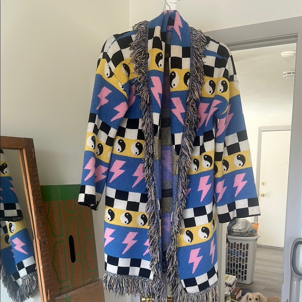 Dressed in LALA lightning bolt duster